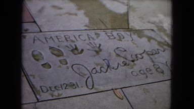 1967: people walk across hollywood memorial CALIFORNIA