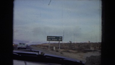 1967: view from a moving car along a highway LAS VEGAS
