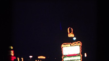 1967: desert inn and silver slipper casino signs in las vegas LAS VEGAS