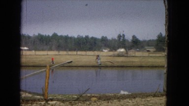 1967: kid run water aside redshirt following kid play ARIZONA