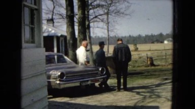 1967: Three Men Standing at a Car Talking Arizona