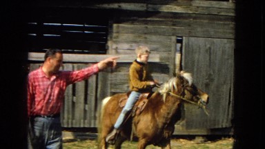 1967: a child is riding a pony in a rural area ARIZONA
