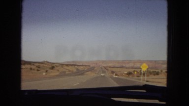 1967: people on vacation drive on the interstate through the american southwest