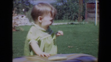 1967: little girl is laughing at something TUCSON, ARIZONA