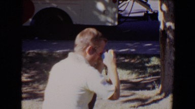 1967: man sitting clicking photo van sale TUCSON, ARIZONA