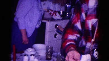 1968: A Couple Making Food and Setting the Table for a Family Meal in Minnesota