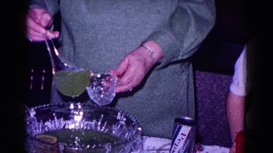 1968: excited, elderly woman uses ladle to get herself some punch MINNESOTA