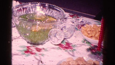 1968: christmas dinner punchbowl, red and green tablecloth and cakes, cupcakes