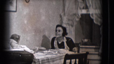 1941: typical american family eating and enjoying a unique moment NEW YORK