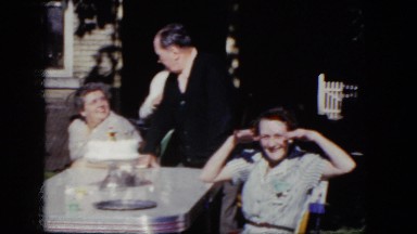 1964: people around all fancy and stylish family parents all good and happy