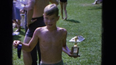 1965: Kid Showing Prize After Event in California