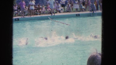 1965: Kid Swimming Freestyle in Pool with Water Waves, California