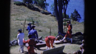 1965: various men in costumes putting on a show reflecting a specific time