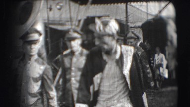 1948: Brass Band with Instruments Walking Through New York Fairground