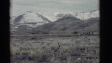 1964: view of mountain ranges showing foothills and then snow-capped peaks