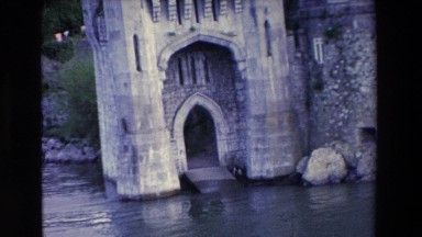 1969: a man standing in the archway of a beautiful old structure