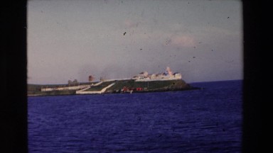 1969: a beautiful lighthouse surrounded by water