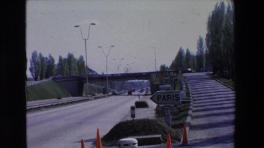 1969: Road with Address Announcements Highlighting Paris