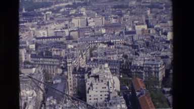 1969: Aerial Color Shot of Densely Populated City Paris, France