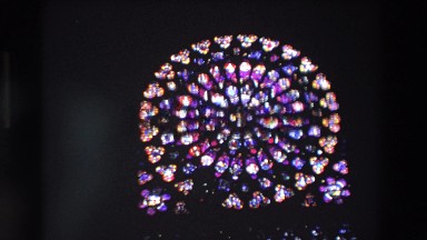 1969: stained glass windows in a very large church with many colors