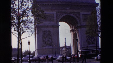 1969: a busy street with historical landmark PARIS, FRANCE