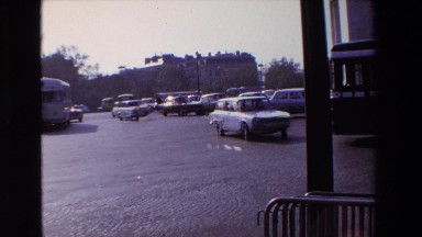 1969: a busy intersection with old fashion cars PARIS, FRANCE