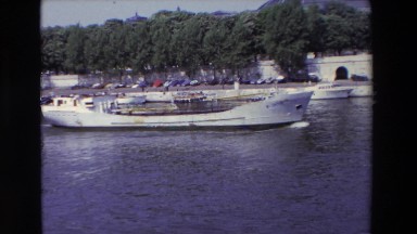 1969: boat floating down body of water PARIS, FRANCE