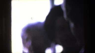 1967: Silhouette of People Gathered at Amsterdam Airport with Airplane on Tarmac