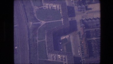 1967: aerial view of a pretty disturbed coastal area with multiple facilities
