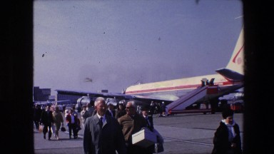 1967: aircraft prepare gate motion airport pushback people walk AMSTERDAM