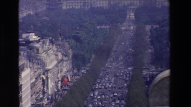 1969: a beautiful woman looking out over a stunning historic city LOURDES