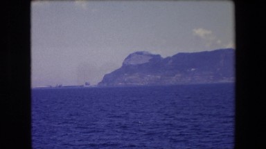 1971: water view mountain wide snow zoom waves moves SPAIN