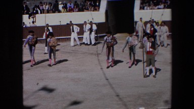 1971: matadors entering sandy bull fighting arena on sunny day in spain SPAIN