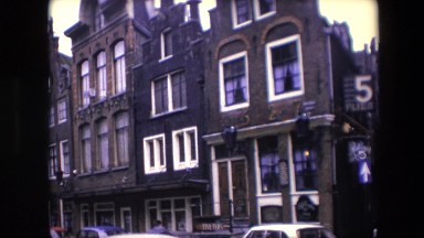 1967: five flies restaurant hanging building sign in neighborhood AMSTERDAM