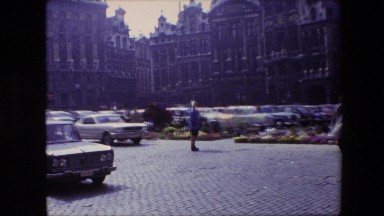 1967: a beautiful historic building as seen from across a cobblestone street