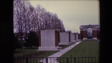 1967: graveyards with lovingly tended graves juxtapozed with mass gravestones