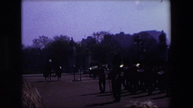 1969: british soldiers marching in a band with crowd gathering LONDON, ENGLAND