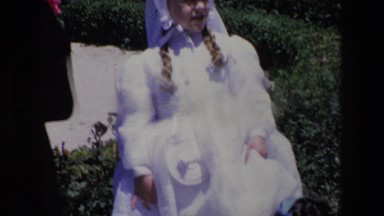 1967: Cute Girl Dressed in White Posing Outdoors in Madrid, Spain