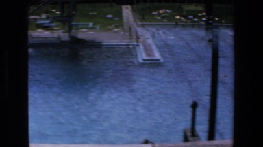 1972: people playing and swimming in a massive outdoor swimming pool MAZATLAN