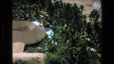 1972: aerial view of the beach of sea with resorts and palm trees MAZATLAN