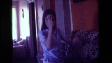 1981: one older girl and one baby girl inside a house on the sofa HOLLYWOOD