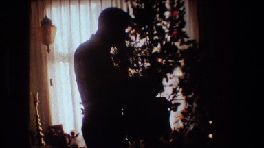 1981: person opening a present LANSING MICHIGAN