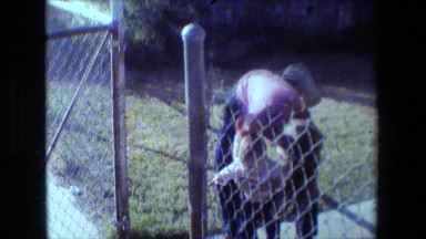 1981: mother letting her baby go take a walk. LANSING MICHIGAN