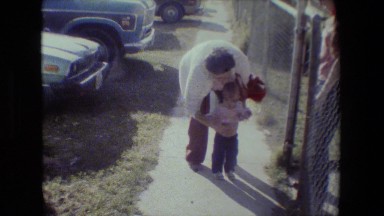 1981: little girl walking around tree LANSING MICHIGAN