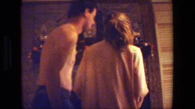 1981: surprise recording of a couple stooping to pick up christmas items