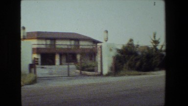 1981: two-story house with large metal gate close to the road MALIBU CALIFORNIA