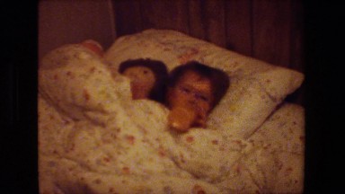 1981: children laying in bed MALIBU CALIFORNIA