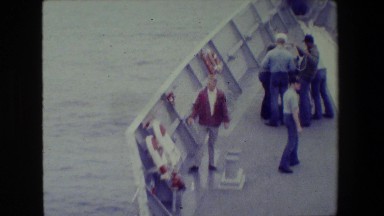 1981: people gathering on a boat discussing SAN DIEGO NAVAL BASE