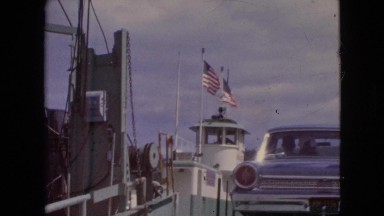 1964: being officially checked and waved along on arrival on the flag