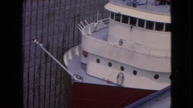 1964: huge ship standing on shore white maintenance fence around NIAGRA FALLS
